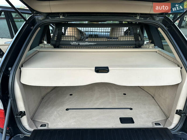 Чорний БМВ Х5, об'ємом двигуна 3 л та пробігом 290 тис. км за 11300 $, фото 12 на Automoto.ua