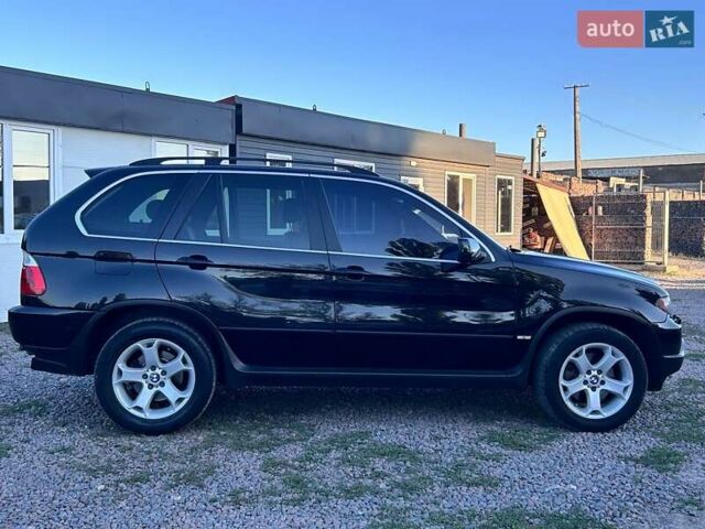 Черный БМВ Х5, объемом двигателя 4.4 л и пробегом 311 тыс. км за 9500 $, фото 3 на Automoto.ua