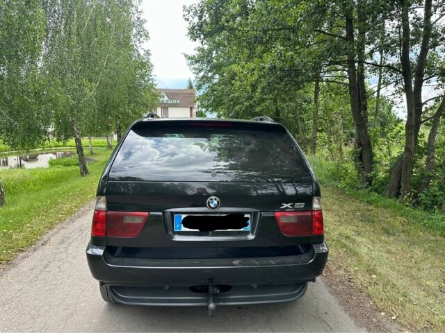 Черный БМВ Х5, объемом двигателя 3 л и пробегом 380 тыс. км за 5600 $, фото 4 на Automoto.ua