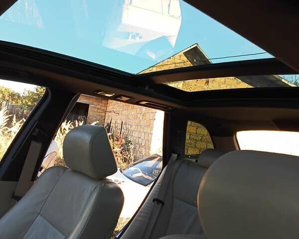 Черный БМВ Х5, объемом двигателя 3 л и пробегом 462 тыс. км за 12900 $, фото 87 на Automoto.ua