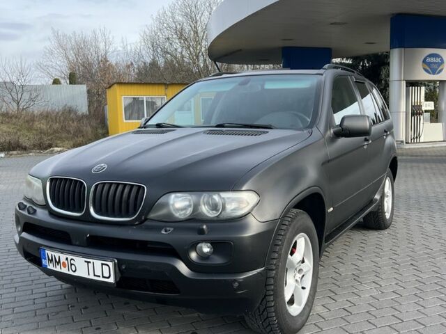 Черный БМВ Х5, объемом двигателя 3 л и пробегом 300 тыс. км за 4750 $, фото 2 на Automoto.ua