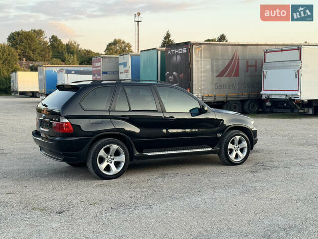Чорний БМВ Х5, об'ємом двигуна 3 л та пробігом 320 тис. км за 12999 $, фото 4 на Automoto.ua