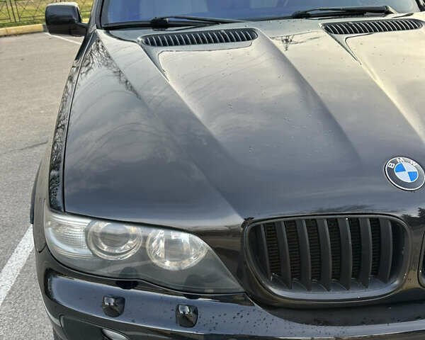 Черный БМВ Х5, объемом двигателя 4.8 л и пробегом 390 тыс. км за 12500 $, фото 16 на Automoto.ua