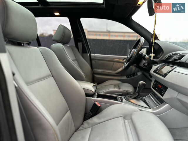 Чорний БМВ Х5, об'ємом двигуна 3 л та пробігом 304 тис. км за 10350 $, фото 62 на Automoto.ua