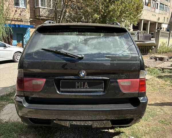 Черный БМВ Х5, объемом двигателя 3 л и пробегом 325 тыс. км за 6500 $, фото 4 на Automoto.ua