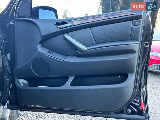 Черный БМВ Х5, объемом двигателя 4.4 л и пробегом 311 тыс. км за 9500 $, фото 34 на Automoto.ua