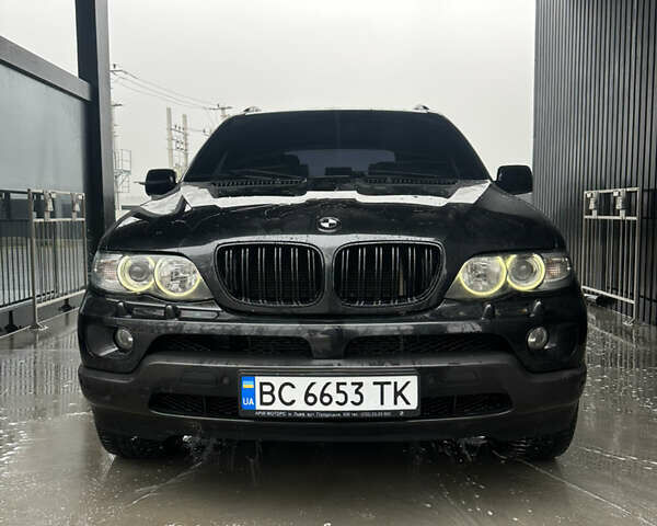 Черный БМВ Х5, объемом двигателя 4.4 л и пробегом 430 тыс. км за 9500 $, фото 3 на Automoto.ua