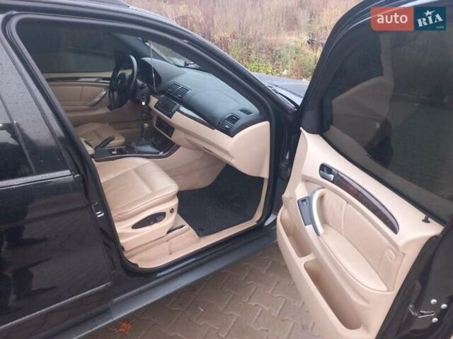 Черный БМВ Х5, объемом двигателя 3 л и пробегом 331 тыс. км за 12500 $, фото 15 на Automoto.ua