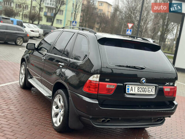 Чорний БМВ Х5, об'ємом двигуна 4.4 л та пробігом 226 тис. км за 11500 $, фото 4 на Automoto.ua