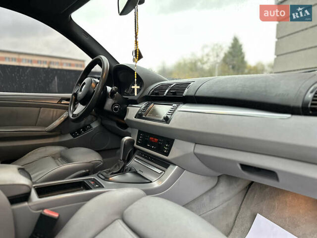 Чорний БМВ Х5, об'ємом двигуна 3 л та пробігом 304 тис. км за 10350 $, фото 59 на Automoto.ua