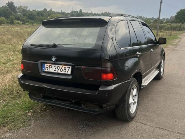 Чорний БМВ Х5, об'ємом двигуна 3 л та пробігом 300 тис. км за 4000 $, фото 3 на Automoto.ua