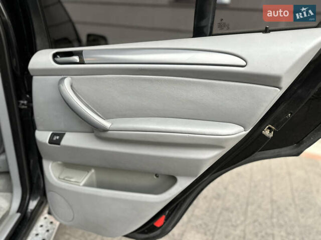 Чорний БМВ Х5, об'ємом двигуна 3 л та пробігом 304 тис. км за 10350 $, фото 69 на Automoto.ua