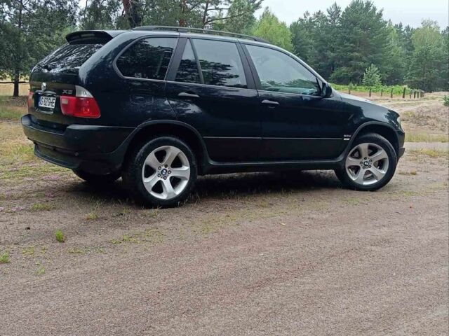 Чорний БМВ Х5, об'ємом двигуна 3 л та пробігом 400 тис. км за 5999 $, фото 13 на Automoto.ua