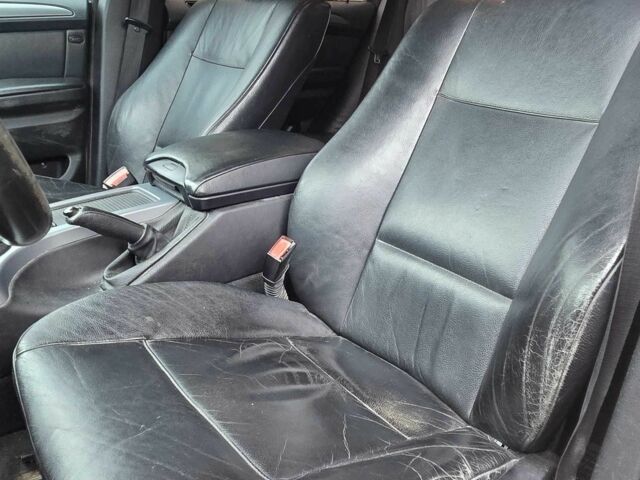 Черный БМВ Х5, объемом двигателя 3 л и пробегом 356 тыс. км за 4655 $, фото 5 на Automoto.ua