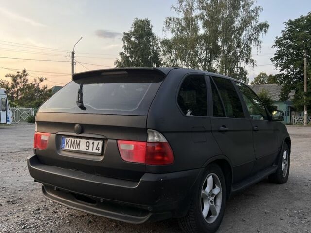 Чорний БМВ Х5, об'ємом двигуна 3 л та пробігом 350 тис. км за 4200 $, фото 5 на Automoto.ua