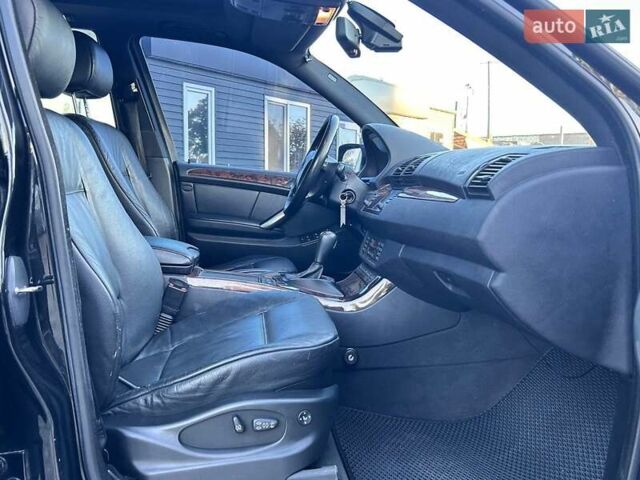 Черный БМВ Х5, объемом двигателя 4.4 л и пробегом 311 тыс. км за 9500 $, фото 33 на Automoto.ua