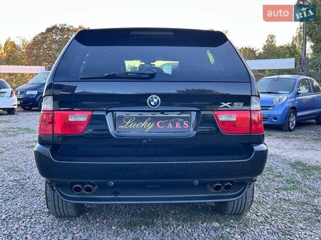Черный БМВ Х5, объемом двигателя 4.4 л и пробегом 311 тыс. км за 9500 $, фото 4 на Automoto.ua