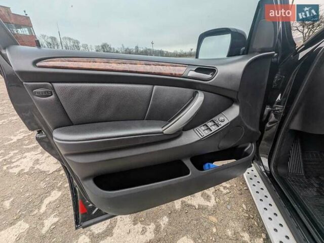 Черный БМВ Х5, объемом двигателя 2.99 л и пробегом 349 тыс. км за 12400 $, фото 16 на Automoto.ua