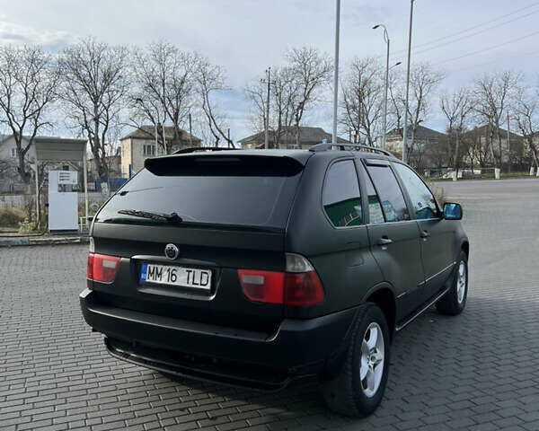 Чорний БМВ Х5, об'ємом двигуна 3 л та пробігом 300 тис. км за 4999 $, фото 12 на Automoto.ua