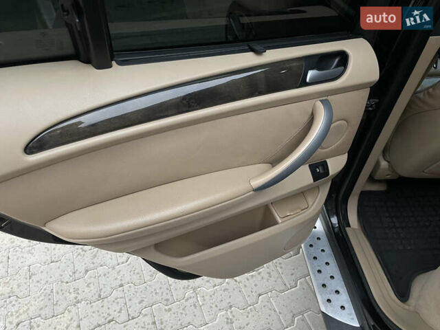 Черный БМВ Х5, объемом двигателя 3 л и пробегом 350 тыс. км за 12900 $, фото 36 на Automoto.ua