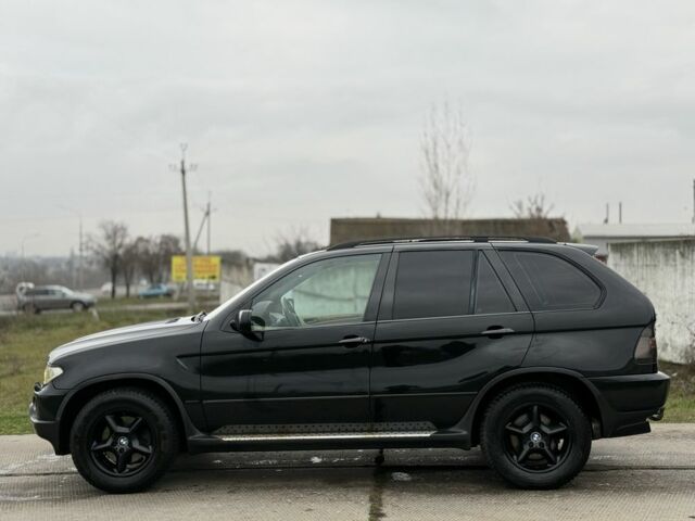 Чорний БМВ Х5, об'ємом двигуна 3 л та пробігом 310 тис. км за 6850 $, фото 2 на Automoto.ua