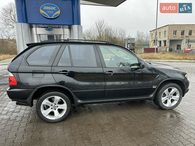 Чорний БМВ Х5, об'ємом двигуна 3 л та пробігом 320 тис. км за 5999 $, фото 6 на Automoto.ua