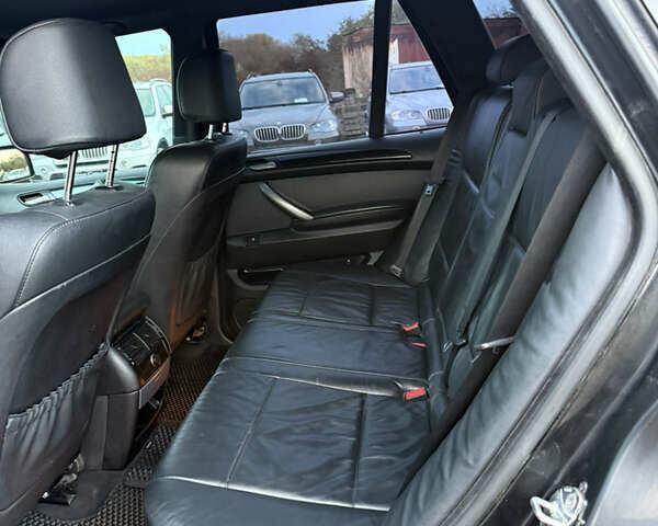 Черный БМВ Х5, объемом двигателя 3 л и пробегом 447 тыс. км за 12199 $, фото 48 на Automoto.ua