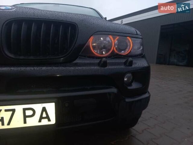 Черный БМВ Х5, объемом двигателя 3 л и пробегом 331 тыс. км за 12500 $, фото 34 на Automoto.ua