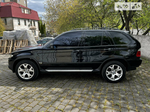 Чорний БМВ Х5, об'ємом двигуна 3 л та пробігом 300 тис. км за 13200 $, фото 13 на Automoto.ua
