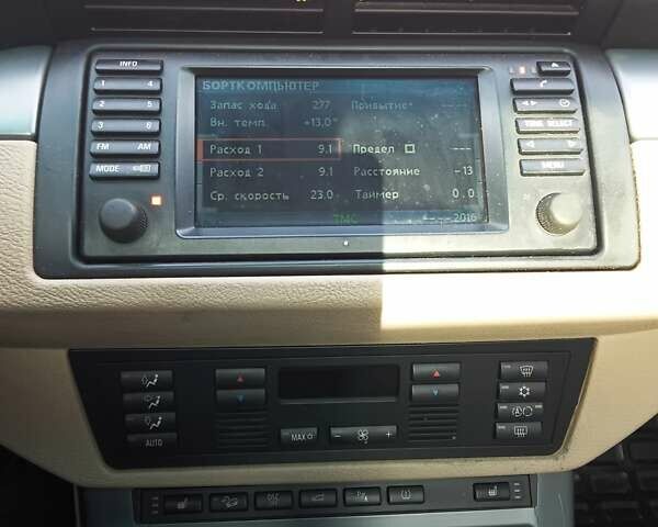 Черный БМВ Х5, объемом двигателя 3 л и пробегом 462 тыс. км за 12900 $, фото 76 на Automoto.ua