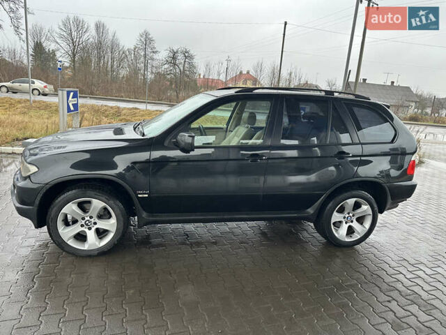 Чорний БМВ Х5, об'ємом двигуна 3 л та пробігом 320 тис. км за 5999 $, фото 2 на Automoto.ua