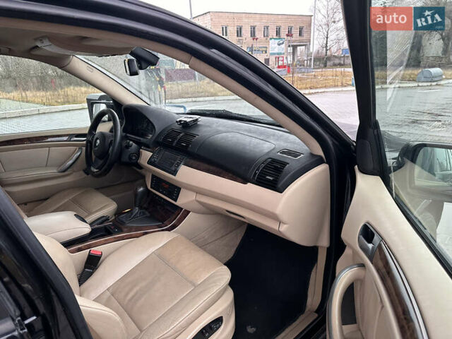 Чорний БМВ Х5, об'ємом двигуна 3 л та пробігом 320 тис. км за 5999 $, фото 14 на Automoto.ua