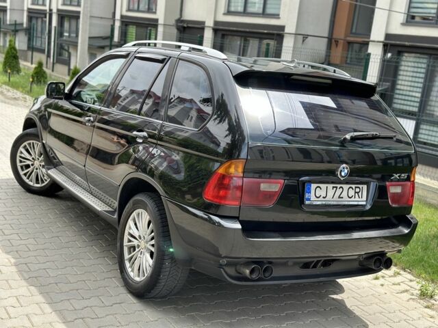 Черный БМВ Х5, объемом двигателя 3 л и пробегом 300 тыс. км за 6100 $, фото 4 на Automoto.ua