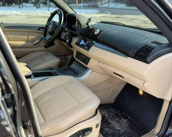 Черный БМВ Х5, объемом двигателя 3 л и пробегом 309 тыс. км за 12700 $, фото 20 на Automoto.ua
