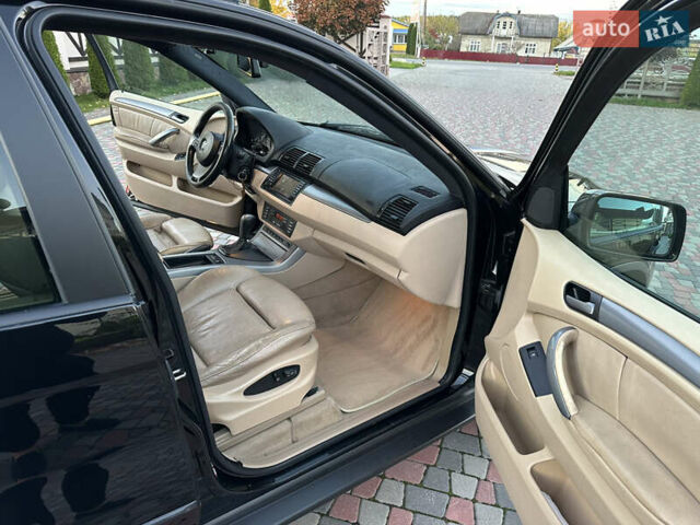Чорний БМВ Х5, об'ємом двигуна 3 л та пробігом 290 тис. км за 11300 $, фото 21 на Automoto.ua