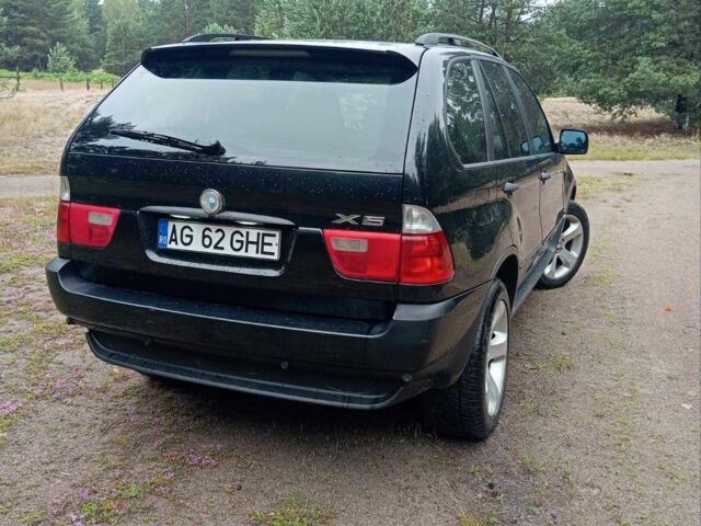 Чорний БМВ Х5, об'ємом двигуна 3 л та пробігом 400 тис. км за 5999 $, фото 10 на Automoto.ua