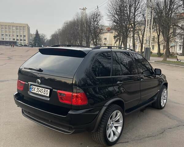 Чорний БМВ Х5, об'ємом двигуна 3 л та пробігом 400 тис. км за 13000 $, фото 6 на Automoto.ua