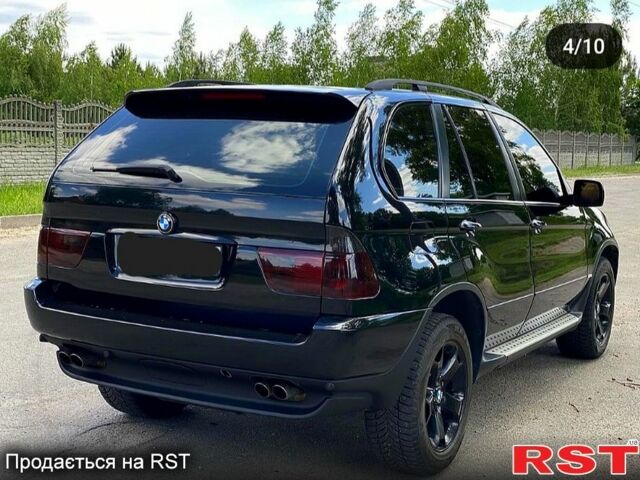Черный БМВ Х5, объемом двигателя 4.4 л и пробегом 0 тыс. км за 9300 $, фото 3 на Automoto.ua