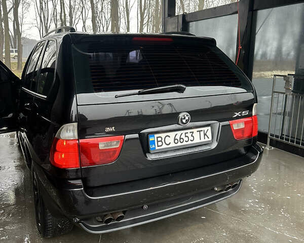 Черный БМВ Х5, объемом двигателя 4.4 л и пробегом 430 тыс. км за 9500 $, фото 7 на Automoto.ua
