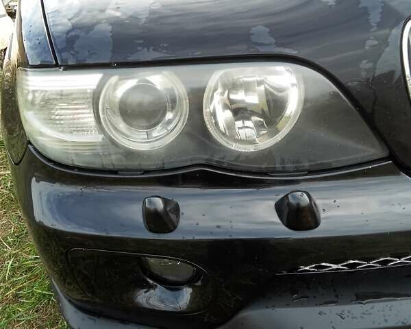 Черный БМВ Х5, объемом двигателя 3 л и пробегом 462 тыс. км за 12900 $, фото 72 на Automoto.ua