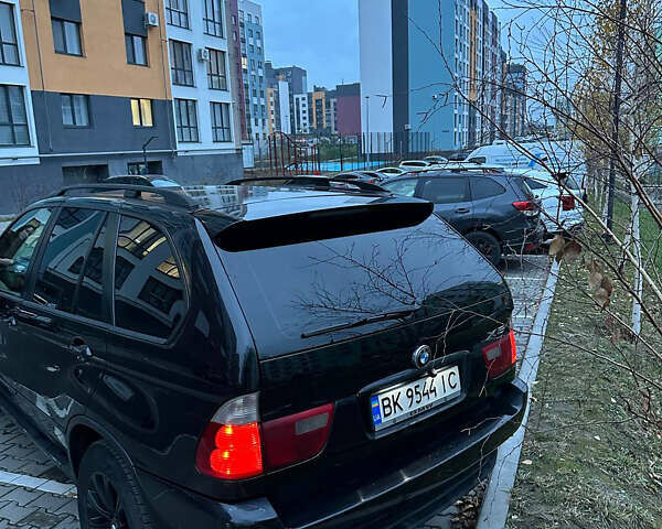 Черный БМВ Х5, объемом двигателя 3 л и пробегом 240 тыс. км за 11200 $, фото 3 на Automoto.ua