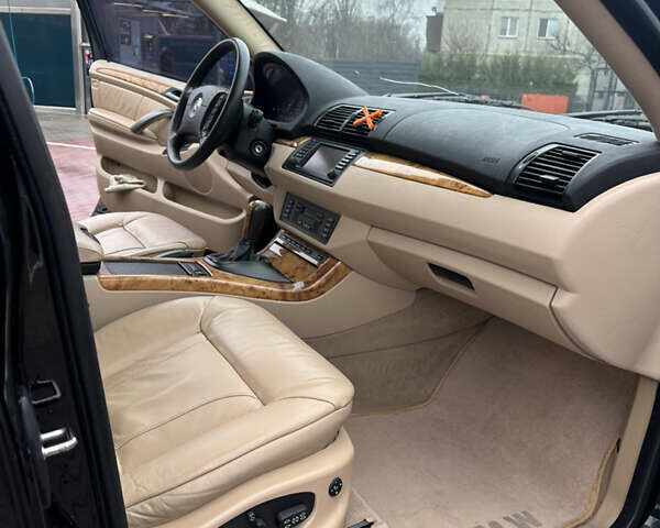 Чорний БМВ Х5, об'ємом двигуна 4.4 л та пробігом 226 тис. км за 11500 $, фото 11 на Automoto.ua