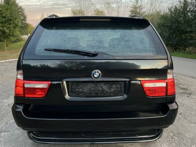Чорний БМВ Х5, об'ємом двигуна 3 л та пробігом 400 тис. км за 6000 $, фото 4 на Automoto.ua