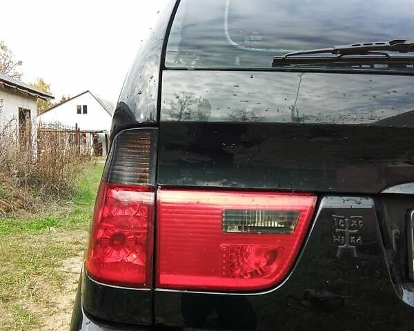 Черный БМВ Х5, объемом двигателя 3 л и пробегом 462 тыс. км за 12900 $, фото 65 на Automoto.ua
