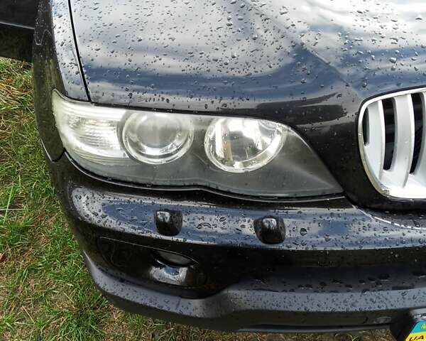 Черный БМВ Х5, объемом двигателя 3 л и пробегом 462 тыс. км за 12900 $, фото 38 на Automoto.ua