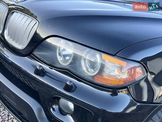 Черный БМВ Х5, объемом двигателя 4.4 л и пробегом 311 тыс. км за 9500 $, фото 8 на Automoto.ua