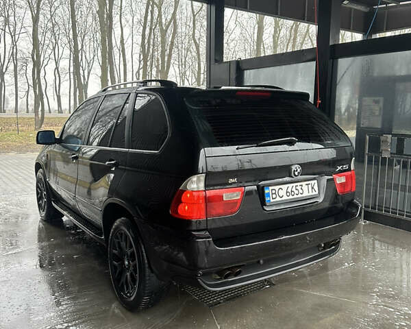 Черный БМВ Х5, объемом двигателя 4.4 л и пробегом 430 тыс. км за 9500 $, фото 2 на Automoto.ua