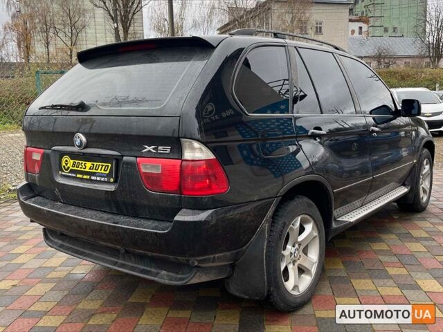 Чорний БМВ Х5, об'ємом двигуна 3 л та пробігом 340 тис. км за 11200 $, фото 6 на Automoto.ua