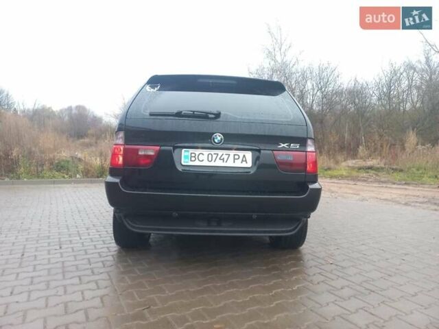 Черный БМВ Х5, объемом двигателя 3 л и пробегом 331 тыс. км за 12500 $, фото 4 на Automoto.ua
