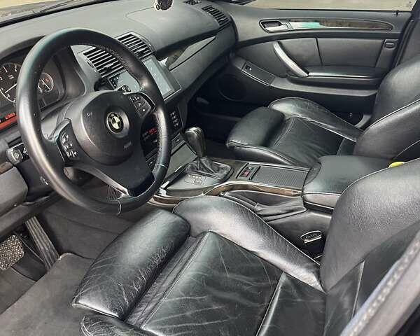 Чорний БМВ Х5, об'ємом двигуна 3 л та пробігом 400 тис. км за 13000 $, фото 2 на Automoto.ua